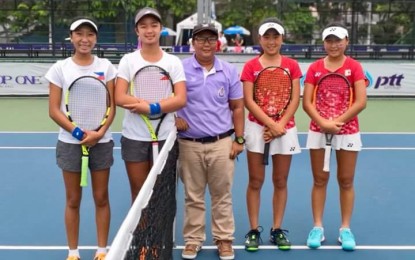 <p>Ma. Carmencita Carlos (far left) and Alexandra Eala (second from left) pose with the Japanese players before their doubles match on Thursday (April 5, 2018). <em>(Photo courtesy of Michael Francis Eala)</em></p>