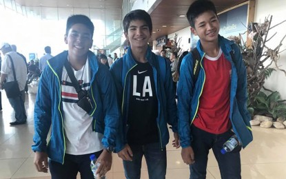 <p><strong>JUNIOR TENNISTERS.</strong> Philippine Junior Davis Cup players (L-R) Jose Antonio Tria, Matthew Anton Garcia and Michael Francis Eala II arrived at the Kuching International Airport in Malaysia on Friday (April 6, 2018). <em>(Photo courtesy of Rizza Maniego-Eala)</em></p>