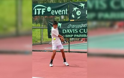 <p>Michael Francis Eala II in action during the Philippine vs Japan match in the Junior Davis Cup Asia/Oceania Final Qualifying Round at the Sarawak Lawn Tennis Association (SLTA) hard court in Kuching, Malaysia on April 11, 2018. <em>(Photo courtesy of Michael Francis Eala)</em></p>