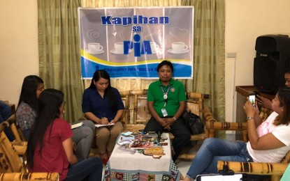 <p><strong>READY FOR THE POLL</strong>S: Jomel Ordas (sitting middle in green polo shirt), the spokesperson of the Palawan Commission on Elections, answers questions of the local media during a PIA-hosted Kapihan on Thursday (April 19, 2018). <em>(Photo by Celeste Anna R. Formoso)</em></p>