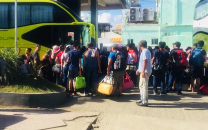 <p><strong>'EXODUS'</strong>. Passengers from Boracay Island flock to the Caticlan Jetty Port  to take buses going to other Western Visayas provinces on Thursday (April 26, 2018), the first day of closure. <em>(Photo by Philippine Coast Guard-Caticlan Station Commander Lt. Ramil Palabrica)</em></p>