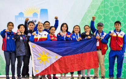 <p><strong>PH WEIGHTLIFTERS.</strong> The members of the Philippine delegation in a group shot taken after the awarding ceremony of the 25th Asian Junior Women and 32nd Asian Junior Men Weightlifting Championships and the 20th Asian Youth Championships held recently in Urgench, Uzbekistan.<em> (Photo courtesy of Elien Rose Perez)</em></p>