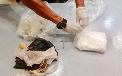 <p><strong>WASHED ASHORE</strong>. Photo shows the suspected cocaine found along the shoreline of Cuyo, Palawan on Saturday (May3, 2018). <em>(Photo by Cuyo Coast Guard Station)</em></p>