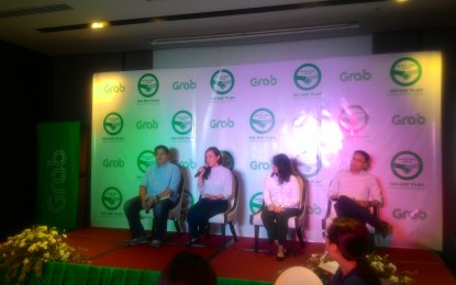 <p>Grab country marketing head Cindy Toh explains its 100-day plan to improve driver behavior and welfare, provide better ride experience and upgrade customer support during a press conference in Makati City Tuesday. </p>
