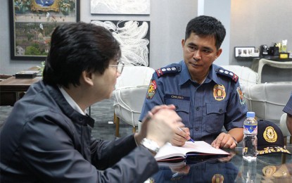 <p><strong>RELIEVED.</strong> Senior Superintendent Edgar Alan Okubo (right),  meeting with Presidential Assistant for the Visayas Michael Lloyd Dino in this photo, was relieved as Cebu Provincial Police Office director effective Tuesday (May 8, 2018). (<em>Photo courtesy of the Office of the Presidential Assistant for the Visayas</em>)</p>