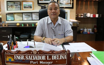 <p>Eng'r. Salvador Delina, port manager of Dapitan City, answers questions in an interview on Wednesday afternoon with the Philippine News Agency. <em><strong>(Photo by: Gualberto M. Laput)</strong></em></p>
