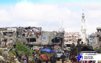 <p><strong>REHAB NEVER STOPPED.</strong> File photo shows the ruins of Marawi City due to the five-month-long clashes between government troops and ISIS-inspired Maute terrorists in 2017. Presidential Spokesperson Harry Roque on Thursday (July 30, 2020) said rehabilitation of Marawi has never stopped, though it was not mentioned by President Rodrigo Duterte in his fifth and penultimate State-of-the-Nation Address on Monday. <em>(PNA file photo)</em></p>