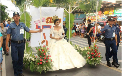 <p><strong>SANTACRUZAN</strong>. For the first time in the long tradition of the “Santacruzan” or the “Flores de Mayo” religious cultural festival in May, the Laguna police provincial command features the lady and male police officers and non-uniformed personnel in the procession of “Reynas” (queens) and “Sagalas” (maidens) escorted by cops in the Laguna capital town of Santa Cruz on May 25, 2018. <em>(Photo courtesy of LPPO)</em></p>