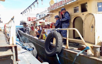 <p><strong>BANNED SUPERLIGHTS:</strong> Personnel of the Coast Guard Station (CGS) Cuyo can be seen onboard FV Mayfair, which is one of the large-scale commercial fishing vessels that were taken under custody for using the banned 'superlights' within the 15-kilometer municipal waters of Magsaysay town. <em>(Photo courtesy of CGS Cuyo)</em></p>