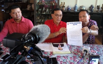 <p>Zamboanga City first district Rep. Celso Lobregat (center) answers questions of reporters in a recent press conference. On his left is first district Councilor Joselito Marcohon and right is lawyer Melchor Sadain, former first district city councilor. <em><strong>(File photo: Teofilo P. Garcia Jr)</strong></em></p>