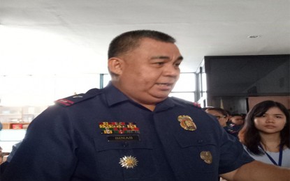 <p>DRUG TEST. Newly-installed OIC Police Regional Office - Central Visayas (PRO-7) Director Chief Supt. Debold Sinas talks to reporters during the surprise drug test of PRO-7 personnel on Monday. (<em>Photo by Bebie Jane Casipong/PNA</em>)</p>