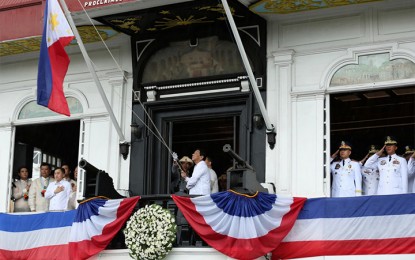 <p><strong>ARAW NG KALAYAAN.</strong> President Rodrigo R. Duterte leads the flag-raising ceremony during the 120th Philippine Independence Day celebration at the Museo ni Emilio Aguinaldo in Kawit, Cavite on June 12, 2018. <em>(Richard Madelo/Presidential Photo) </em></p>