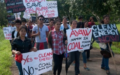 <p><strong>NO TO COAL</strong>: File photo shows residents of Palawan protesting the 15-megawatt DMCI Power Corp.'s coal-fired power plant in Narra town. <em>(Photo courtesy of Elizaleen Bumanlag)</em></p>