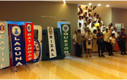 <p><strong>SUMMIT</strong>. Scores of newly-elected barangay chairpersons from the Calabarzon provinces of Cavite, Laguna, Batangas, Rizal and Quezon troop to the Sta. Rosa City Sports Complex for the Regional Summit and Mass Oath-taking rites Thursday (June 14, 2018). The Department of Interior and Local Government dared them to fight the continuing threat of violent extremism and terrorism that beset barangays and local communities.<em> (Photo by Saul Pa-a)</em></p>