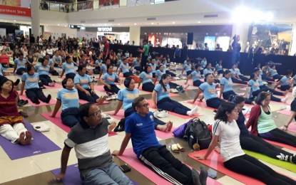 <p>FITNESS REGIMEN. Hundreds of participants stretched their way to fitness through yoga at the 4th International Day of Yoga organized by the India Embassy in Muntinlupa City on Sunday (June 17, 2018). <em>(Photo by Joyce L. Rocamora)</em></p>