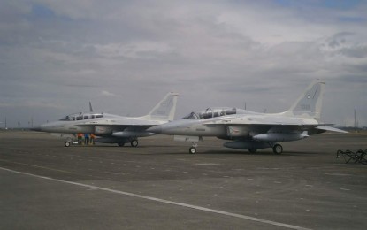 <p>Two of the FA-50PH light-interim fighter trainers acquired by the military during Horizon One. <em>(PNA photo by Priam F. Nepomuceno)</em></p>