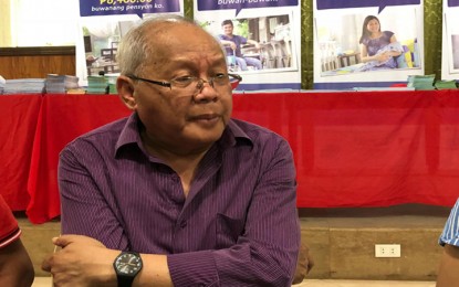 <p>SSS President and Chief Executive Officer Atty. Emmanuel Dooc being interviewed by PNA. <em>(Photo by Celeste Anna R. Formoso)</em></p>