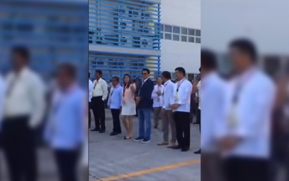 <p>Screenshot of the video of Tanauan, Batangas Mayor Antonio Halili singing the national anthem with city officials, posted on Facebook by information office chief Gerardo Laresma. </p>