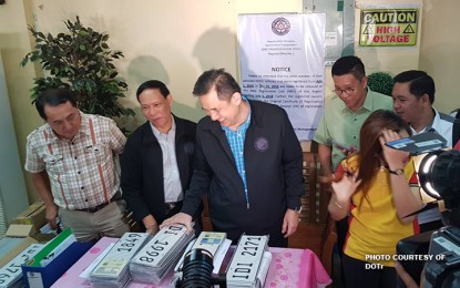 <p>LICENSE PLATES RELEASE. Department of Transportation Undersecretary Tim Orbos and Land Transportation Office Director Francis Almora lead the release of the first batch of motor vehicle plates at the LTO Dagupan Regional Office on Thursday, July 5. <em>(Photo courtesy of DOTr)</em></p>