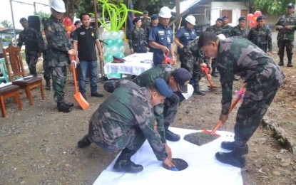 <p>Police Regional Office-11 Director Manuel Gaerlan (with shovel) leads the laying of time capsule for the the construction of the Regional Mobile Force Battalion on Tuesday. <em><strong>Photo courtesy of PRO-11 PIO</strong></em></p>