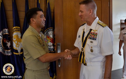 <p><strong>TRADITIONAL ALLIES</strong>. Philippine Navy chief-of-naval staff, Rear Admiral Erick A. Kagaoan (left) welcomes US Pacific Fleet Task Force 73 commander, Rear Admiral Murray Joe Tynch III, at the Navy headquarters on Thursday (July 12, 2018). During their meeting, Kagaoan and Tynch discussed the two countries’ strong relationship in maritime security, the campaign against terrorism, and disaster response. <em>(Photo courtesy of the Naval Public Affairs Office)</em></p>