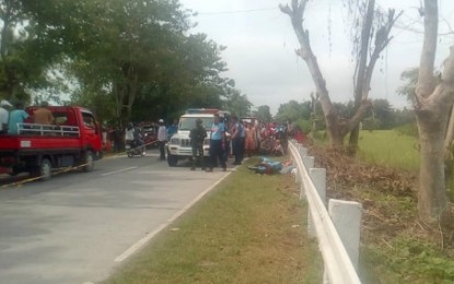 <p><strong>AMBUSHED.</strong> Police cordoned off a portion of the highway in Barangay San Antonio, Tacurong City, where Police Officer 2 Rolly Kamid was shot dead by still unidentified gunmen on Sunday (July 15, 2018). <em><strong>(Photo courtesy of Tacurong PNP).</strong></em></p>