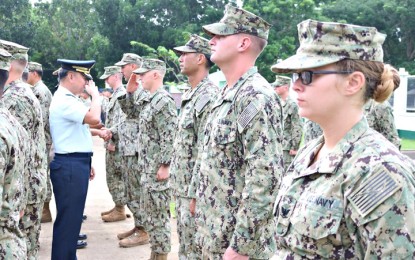 <p><strong>AWARDING OF MILITARY CIVIC ACTION MEDALS.</strong> Western Command (Wescom) commander Lt. General Rozzano Briguez awards the military civic action medals to the U.S. Navy Seabees and their Filipino counterparts on Monday (July 16, 2018). <em>(Photo courtesy of Wescom PAO) </em></p>
