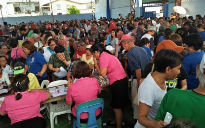 <p><strong>PENSIONERS</strong>. Thousands of indigent elderly from the City Proper district troop to Barangay Veterans Village gymnasium for the distribution of social pension on Wednesday (July 18, 2018). <em>(Photo by Perla Lena) </em></p>