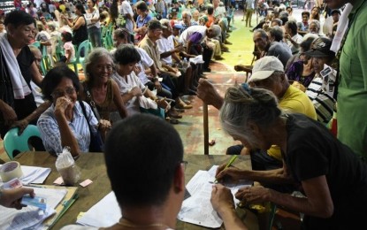 <p>INDIGENT SENIORS GET SOCIAL PENSION. Indigent senior citizens in Bacolod City line up to claim their social pension for the first quarter of the year at the BAYS Center on Thursday, July 19. <em>(Photo courtesy of Bacolod City PIO)</em></p>
<p> </p>