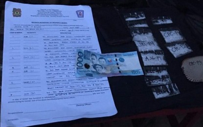 <p>Operatives of the Bacolod City Drug Enforcement Unit seize PHP360,000 worth of “shabu” from four suspects, including an AWOL policeman, at Purok Chereza 2, Barangay 27 Saturday evening. <em>(Photo courtesy of Bacolod City Police Office)</em></p>