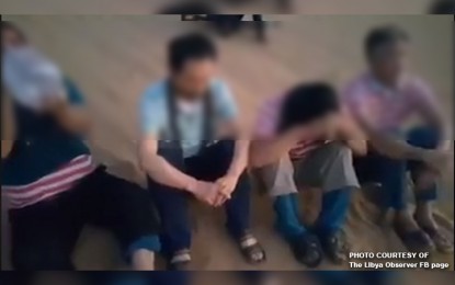 <p><strong>ABDUCTED IN LIBYA.</strong> The Department of Foreign Affairs confirmed that three of the four men in a video calling for assistance from Libya were Filipino technicians abducted by an unidentified armed group last month. <em>(Screengrab from The Libya Observer FB page)</em></p>