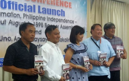 <p><strong>BACOOR ASSEMBLY 1896. </strong>Bacoor City Mayor Lani Mercado Revilla (center) leads the re-launching of the book “PROCLAMATION: The Philippine Independence (The Truth about Aug. 1, 1898 Bacoor Assembly, A Historiographical Inquiry)”, along with the documentary film “Agosto Uno, Kasaysayang Nakalimutan” during a press conference at the city hall on Monday (Aug. 6). Joining her (from left) are Bacoor Historical Society President Dr. Jose Andres L. Diaz, Philippine Historical Association President and author Dr. Emmanuel F. Calairo, Bacoor City Tourism Development Head Edwin Guinto and Jose Napoleon L. Cuenca - current head of Bacoor’s Tourism Cluster and great grandson of the original owners of “Bahay na Tisa” or Aguinaldo’s “Malacañang.<em> (Photo by Gladys S. Pino, PNA)</em></p>