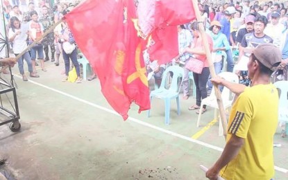 <p style="font-weight: 400;"><strong>BURNED.</strong> The flag of the Communist Party of the Philippines-New People’s Army was burned by former supporters of the rebel group in a ceremony held <span data-term="goog_1406074336">on Wednesday (August 8, 2018)</span> at Barangay Carabalan, Himamaylan City in Negros Occidental facilitated by the Army’s 62<sup>nd</sup> Infantry Battalion.<em> (Photo from the 62<sup>nd</sup> IB, Unifier Battalion Facebook account)</em></p>