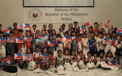 <p>Chinese children learn facts about the Philippines in a “Ni Hao, Philippines” activity at the Philippine Embassy in Beijing on Aug. 9, 2018. <em>(Photo by Greggy Eugenio)</em></p>