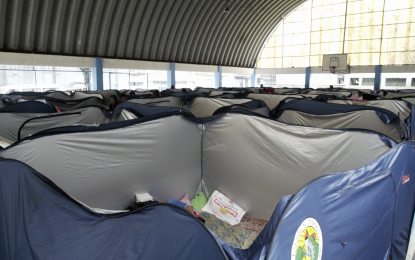 <p><strong>MODULAR TENTS.</strong> The city government of Marikina purchased some 500 modular tents for use at evacuation centers during disaster and emergencies. In Barangay Malanday, Marikina City, families affected by flooding stay comfortably inside the tents which can accommodate five to seven persons. <em>(PNA photo by Jayrome Pablo)</em></p>