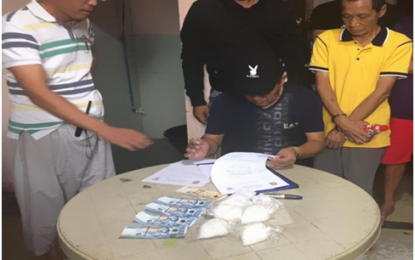 <p><strong>DRUG HAUL</strong>. Dasmariñas City Drug Enforcement Unit (CDEU) agents conduct an inventory of the seized seven plastic packs, containing some 625 grams of suspected “shabu” worth PHP 4.25 million, from one of the four drug suspects during the drug-bust operation in Barangay Datu Esmael on Aug. 13, 2018. <em>(Photo by Dennis Abrina/PNA)</em></p>