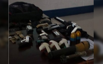 <p style="margin: 0in 0in 7.9pt 0in;"><span style="color: black;"><strong>CONFISCATED.</strong> Weapons, explosives, cellphones, knapsacks and tablets were seized from the revolutionary group the Regional Taxation Implementing Group of the Komiteng Rehiyon Panay. Seven members of the group died in an encounter with government of troops at Barangay Atabay, San Jose in Antique on Wednesday (August 15, 2018). <em>(Photo by Annabel Petinglay) </em></span></p>
<p style="margin: 12.0pt 0in 7.9pt 0in;"><span style="font-size: 9.0pt; font-family: 'Helvetica','sans-serif'; color: #4b4f56; background: #F1F0F0;"> </span></p>
<p style="margin: 0in 0in 7.9pt 0in;"> </p>