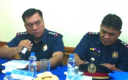 <p><strong>POLICE BRIEFING.</strong> Senior Superintendent Lyndon Mencio (left) head of Benguet Provincial Police Office (BPPO), reports the accomplishments of the provincial police on Wednesday (Aug.15, 2018) during a regular press conference at the provincial police headquarters in Camp Bado, Dangwa, La Trinidad, Benguet. Also in photo is Supt. Luisito Meris (right), Deputy for Administration of BPPO.<em> (Photo by Primo Agatep)</em></p>