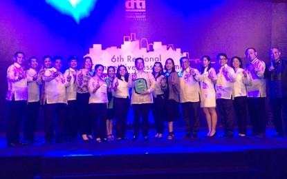 <p><strong>MOST IMPROVED LGU.</strong> Iloilo City receives the Most Improved LGU award for the highly urbanized city category during  the 6<sup>th</sup> Regional Competitiveness Summit held at the PICC, Manila, Thursday (August 16, 2018)<em>. (Photo courtesy of Che Gavan)</em></p>