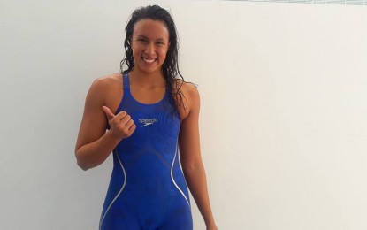 <p><strong>PH SWIMMER QUALIFIES IN 100-M FREESTYLE.</strong> Jasmine Alkhaldi makes a thumbs up sign after qualifying in the final of the women's 100-meter freestyle event in the 18th Asian Games swimming competition at the Gelora Bung Karno (GBK) Aquatic Center on Monday. <em>(Photo courtesy of Judith Caringal/Radyo Pilipinas 2)</em></p>