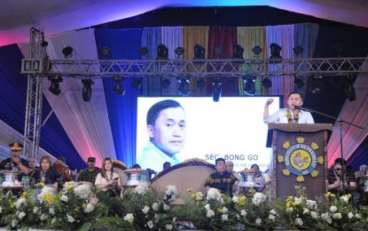 <p>Special Assistant to the President Christopher Lawrence "Bong" Go speaking before the crowd at the gymnasium of Sultan Kudarat, Maguindanao on Monday (Aug. 20) where he was special guest to the culmination rites of the town's 71st founding anniversary. Earlier on same day, the officlal also graced the 4th Kagalawan Festival of Datu Abdullah Sangki in same province. <em><strong>(Photo courtesy of Harris Ma - Cotabato Media Group)</strong></em></p>
