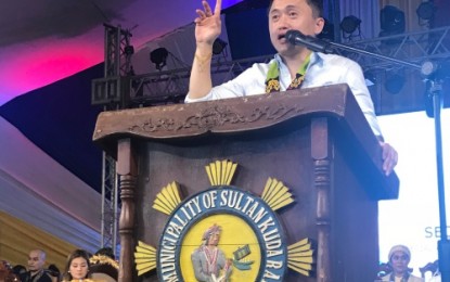 <p>Special Assistant to the President Christopher Lawrence "Bong" Go during his speech at the culmination rites of Sultan Kudarat town's 71st founding anniversary in Maguindanao on Monday (Aug. 20). The official clarified that President Rodrigo Duterte is in tip-top shape and has not gone into coma as alleged by Communist Party of the Philippines founding chair Jose Maria Sison. <em><strong>(Photo by PNA Cotabato)</strong></em></p>
