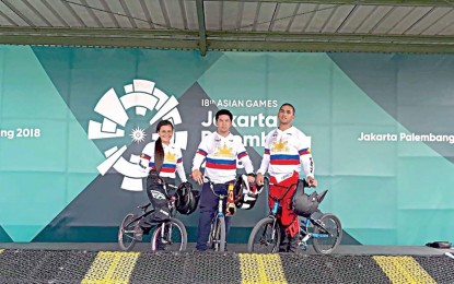 <p><strong>DEFENDING CHAMPION</strong>. BMX rider Daniel Patrick Caluag (center) will try to keep the gold medal he won in Incheon, South Korea four years ago.<em> (Photo courtesy of PSC Media Pool)</em></p>