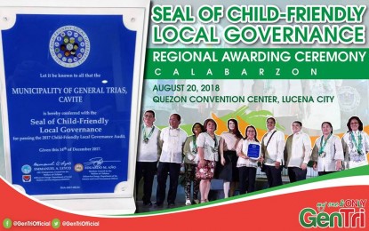 <p><strong>CHILD-FRIENDLY GOVERNANCE.</strong> The city of General Trias receives its 4th 'Seal of Child Friendly Local Governance' Award conferred by the Council for the Welfare of Children (CWC), chaired by the Department of Social Welfare and Development (DSWD) and the Department of the Interior and Local Government (DILG) as partner, during the regional awarding ceremony at the Quezon Convention in Lucena City, Quezon on Monday. <em>(Photo courtesy of General Trias city government)</em></p>