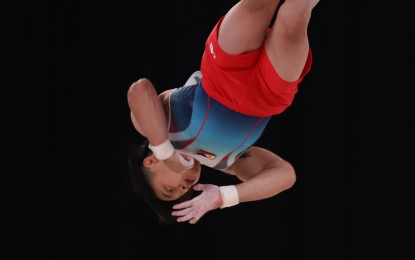 <p>Carlos Edriel Yulo in action during the men's floor exercise final in the 18th Asian Games artistic gymnastics competition at the Jakarta Exhibition Center in Kemayoran, Indonesia. <em>(Photo by PSC Media Pool)</em></p>