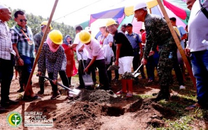 <p><strong>SHELTER PROJECT.</strong> Autonomous Region in Muslim Mindanao Governor Mujiv Hataman (in white shorts and slippers) lead local officials of Datu Blah Sinsuat, Maguindanao, on planting a capsule that signifies the groundbreaking for the 100 core shelter project under the region’s Bangsamoro Regional Inclusive Development for Growth and Empowerment program in the area on Wednesday (Aug. 22). <em><strong>(Photo by BPI-ARMM)</strong></em></p>