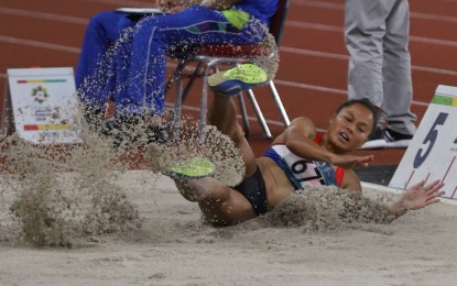 <p><strong>WOMEN'S LONG JUMP.</strong> Marestella Torres Sunang in action during the women's long event of the 18th Asian Games athletics competition at the Gelora Bung Karno Main Stadium on Monday night. <em>(Photo courtesy of INASGOC)</em></p>