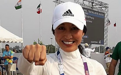 <p><strong>QUALIFIER.</strong> Ma. Antonette Leviste strikes a pose after reaching the second qualifying round of the individual jumping dressage in the 18th Asian Games equestrian competition at the Jakarta International Equestrian Park in Pulomas on Tuesday. <em>(Photo by Judith Caringal/Radyo Pilipinas 2)</em></p>