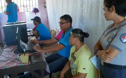 <p><strong>VOTER REGISTRATION.</strong> An inmate of the Metro Bacolod District Jail (MBDJ)-Female Dormitory (seated, 2<sup>nd</sup> from right) participates in the special satellite voter registration held at the jail facility in Barangay Handumanan on Tuesday (August 29, 2018). <em>(Photo from MBDJ-Female Dormitory Facebook account)</em></p>
<p> </p>