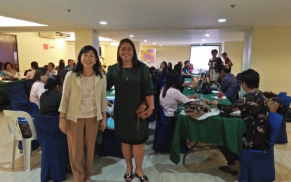 <p>The Department of Education Guimaras Division headed by Superintendent Ma. Luz M. de los Reyes (standing right) gathers principal and supervisors from the province for the roll out of the  Results –Based Performance Management System on Wednesday (August 29, 2018). <em>(Photo by Perla Lena) </em></p>
